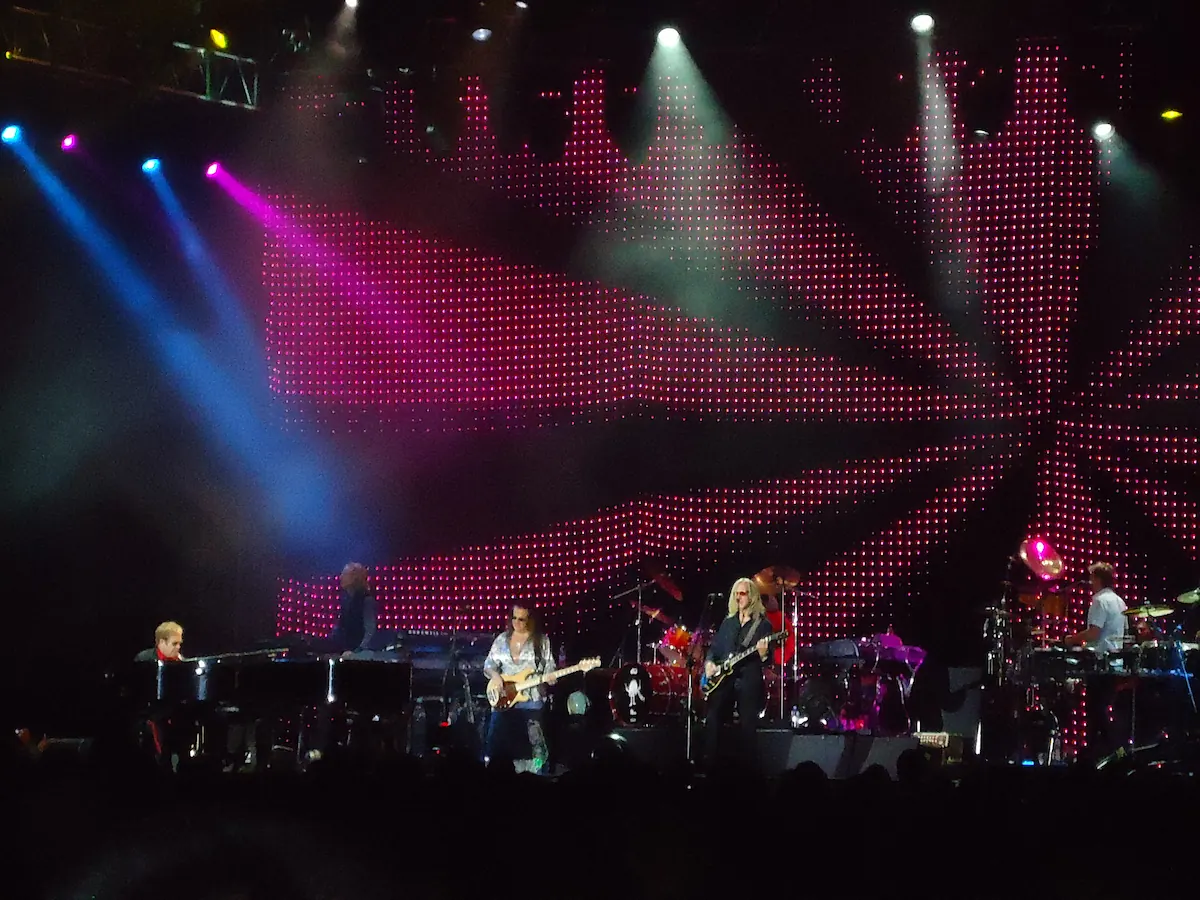Elton John live concert stage moment in Istanbul connected to international artist operations and Illusthrone's professional journey