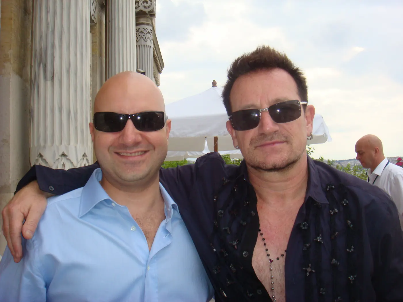 Bono of U2 with Orkun Biliş, Co-Founder of Illusthrone, in a publicly shareable artist hospitality context in Istanbul